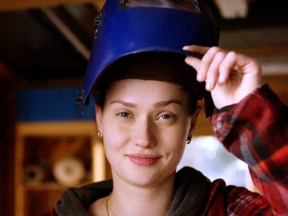 girl with blue helmet working for zehnder